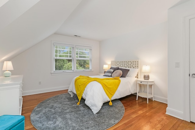 4 Reimer Rd, Westport, CT 06880 - bedroom with lofted ceiling and wood finished floors