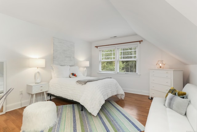 4 Reimer Rd, Westport, CT 06880 - bedroom featuring lofted ceiling and wood finished floors