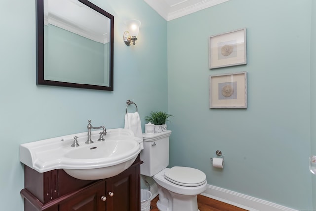 4 Reimer Rd, Westport, CT 06880 - bathroom featuring ornamental molding, vanity, and wood finished floors
