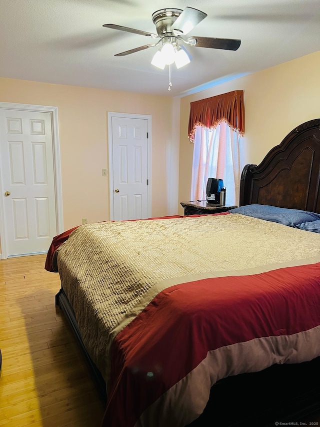 48 Harris Dr, Newington, CT 06111 - bedroom featuring light wood-style floors and ceiling fan
