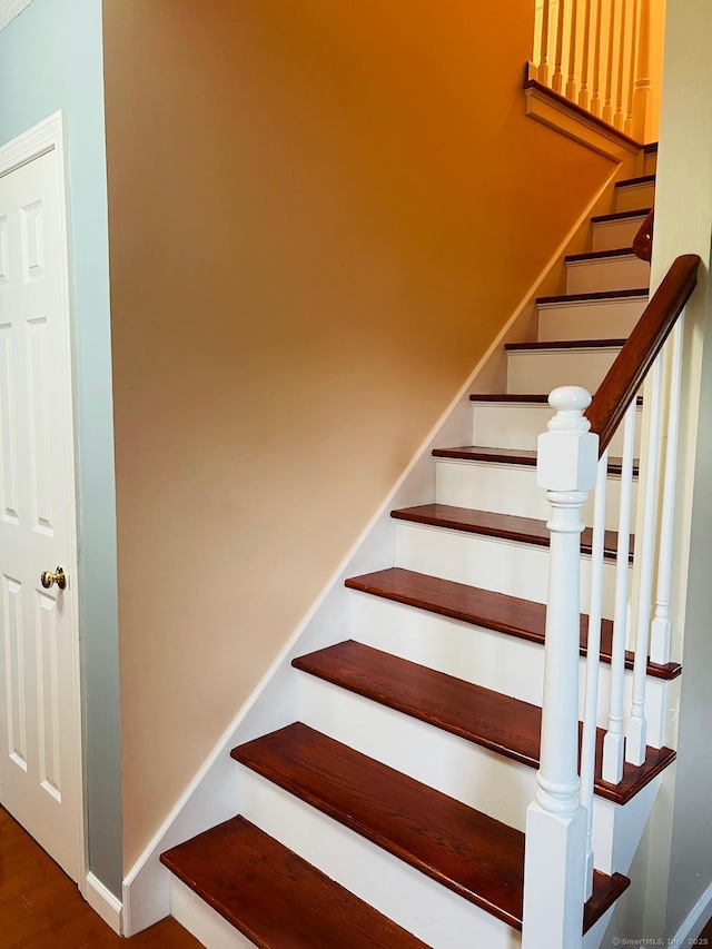 48 Harris Dr, Newington, CT 06111 - stairway featuring wood finished floors and baseboards