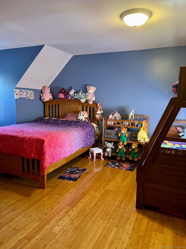 48 Harris Dr, Newington, CT 06111 - bedroom featuring wood finished floors and vaulted ceiling