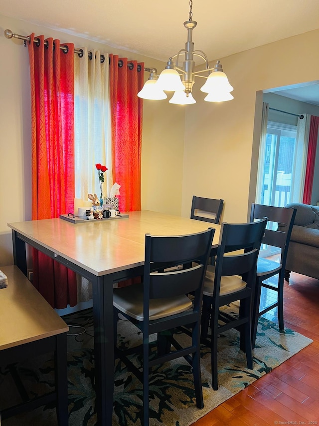 48 Harris Dr, Newington, CT 06111 - dining area with a chandelier and wood finished floors
