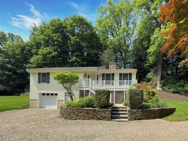 6 Jeffro Dr, Ridgefield, CT 06877 - view of front of home featuring stairs, a porch, a chimney, an attached garage, and gravel driveway
