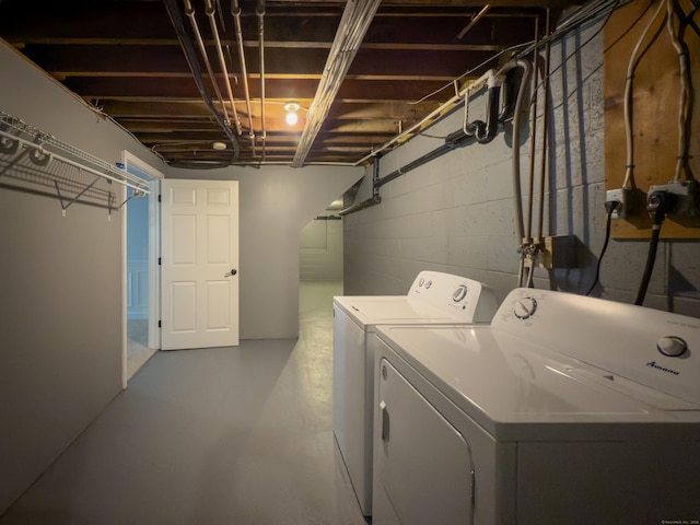 6 Jeffro Dr, Ridgefield, CT 06877 - laundry area with independent washer and dryer and concrete block wall