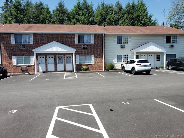 16 Lisa Ct Apt 7, Waterbury, CT 06704 - view of property with uncovered parking