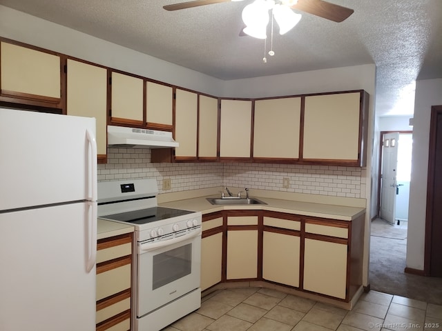16 Lisa Ct Apt 7, Waterbury, CT 06704 - kitchen featuring white appliances, under cabinet range hood, light countertops, a ceiling fan, and a textured ceiling
