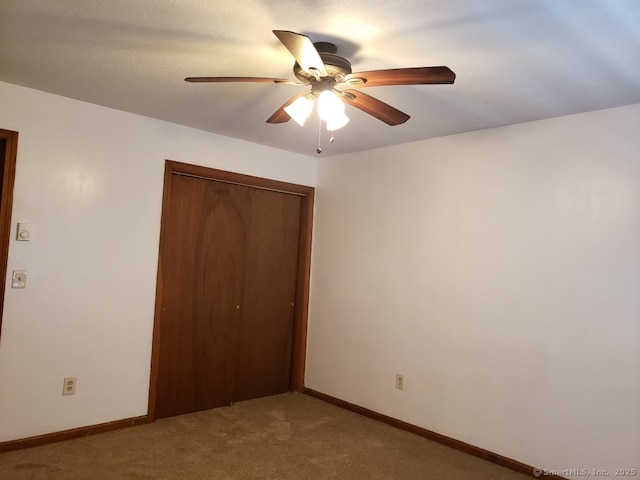16 Lisa Ct Apt 7, Waterbury, CT 06704 - unfurnished bedroom with carpet, a closet, and ceiling fan