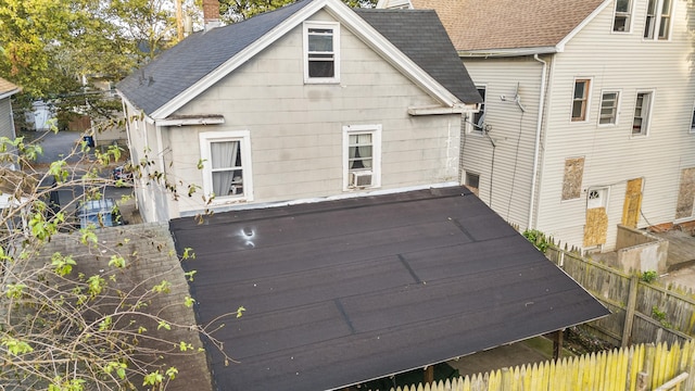 189 Ferry St, New Haven, CT 06513 - rear view of house with a chimney and a shingled roof