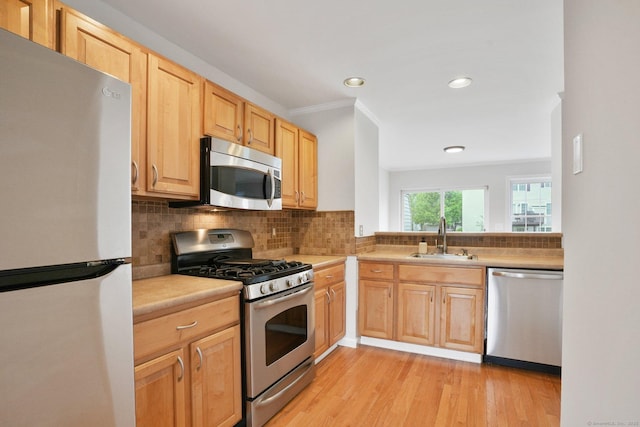 1802 Pinnacle Way Unit 1802, Danbury, CT 06811 - kitchen featuring appliances with stainless steel finishes, light brown cabinetry, light countertops, light wood-style flooring, and recessed lighting