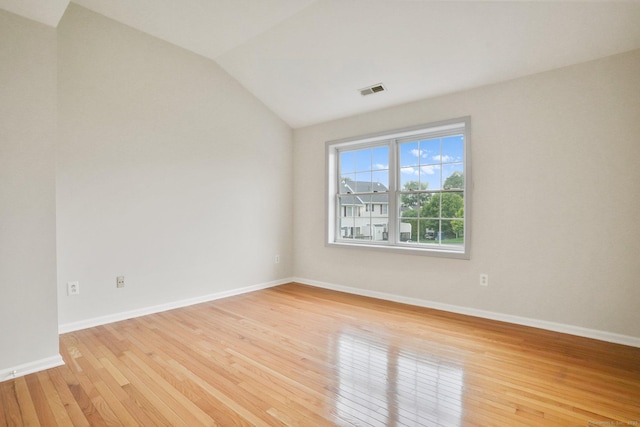 1802 Pinnacle Way Unit 1802, Danbury, CT 06811 - spare room with light wood finished floors and vaulted ceiling