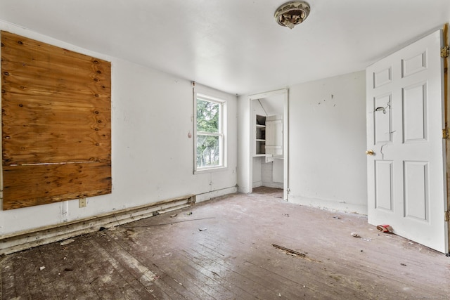 212 Prospect St, Norwich, CT 06360 - unfurnished bedroom featuring hardwood / wood-style flooring