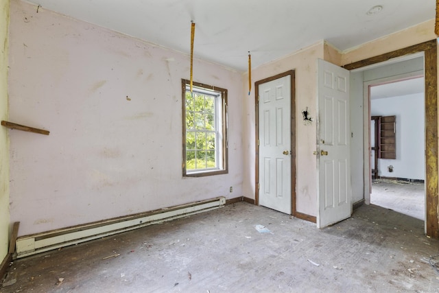 212 Prospect St, Norwich, CT 06360 - unfurnished bedroom featuring a baseboard heating unit