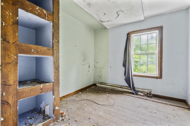 212 Prospect St, Norwich, CT 06360 - unfurnished room featuring baseboards and wood finished floors