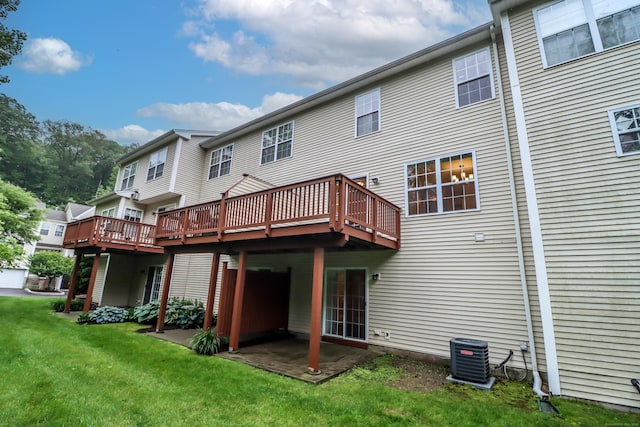 2303 Eaton Ct Unit 2303, Danbury, CT 06811 - rear view of house featuring a lawn, a deck, and a patio area