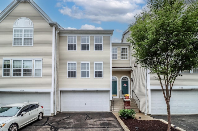 2303 Eaton Ct Unit 2303, Danbury, CT 06811 - view of property with driveway and a garage