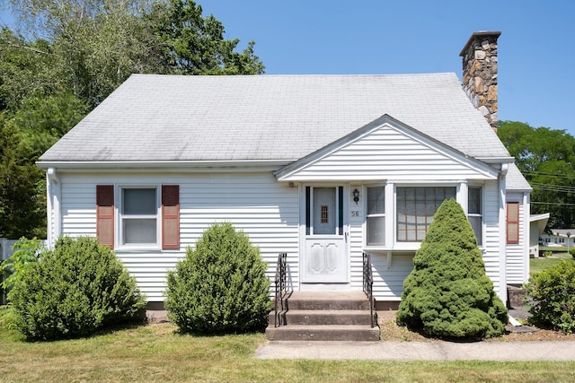 56 Franklin St, Vernon, CT 06066 - view of front of home with a chimney