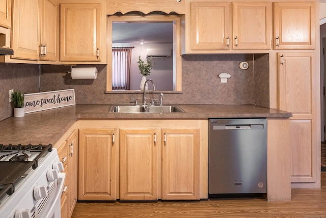56 Franklin St, Vernon, CT 06066 - kitchen with stainless steel dishwasher, backsplash, light brown cabinets, and wood finished floors