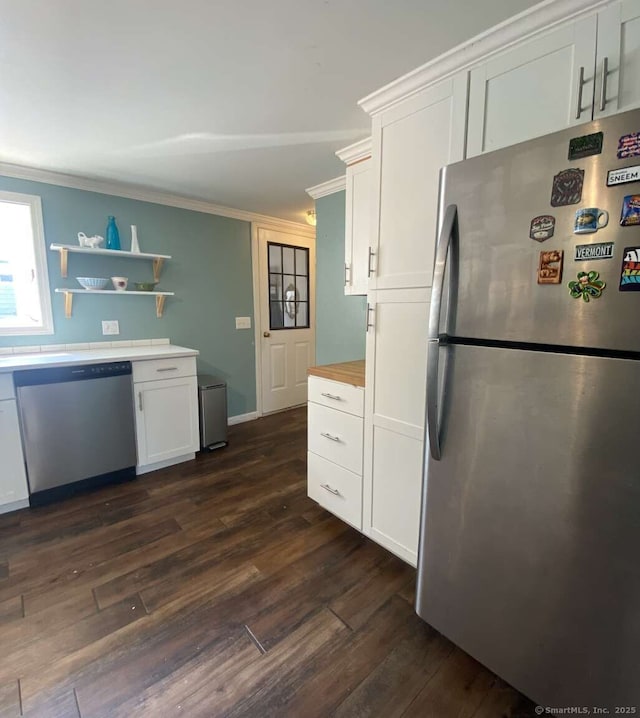 50 Howe St, Milford, CT 06460 - kitchen with appliances with stainless steel finishes, ornamental molding, dark wood finished floors, white cabinets, and light countertops