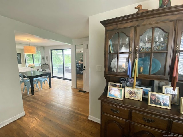 50 Howe St, Milford, CT 06460 - corridor with wood finished floors and baseboards