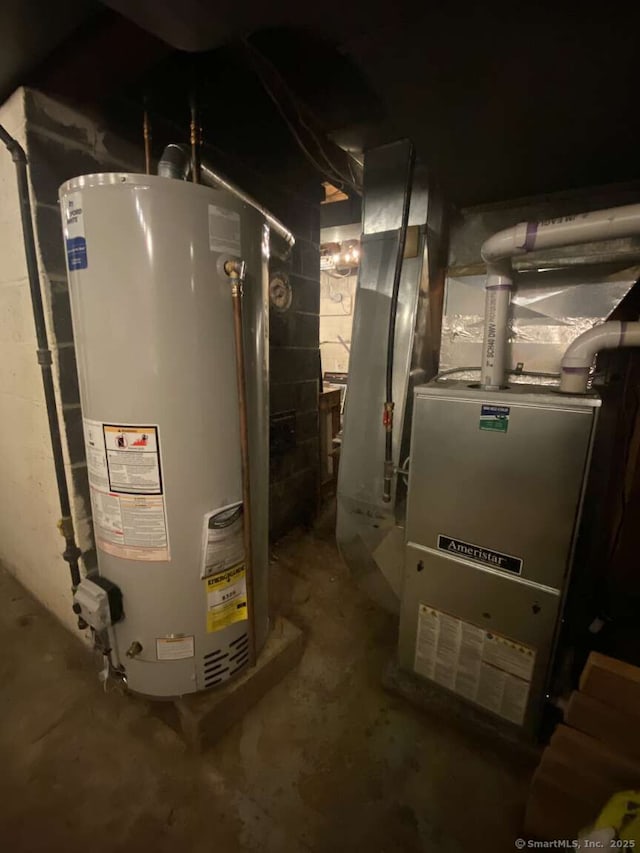 50 Howe St, Milford, CT 06460 - utility room featuring gas water heater