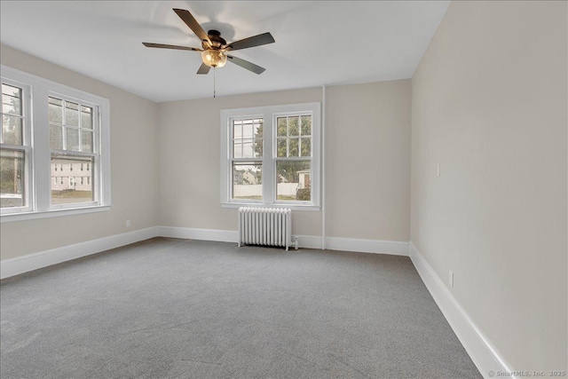 219 Jordan Ln, Wethersfield, CT 06109 - carpeted spare room with radiator and ceiling fan
