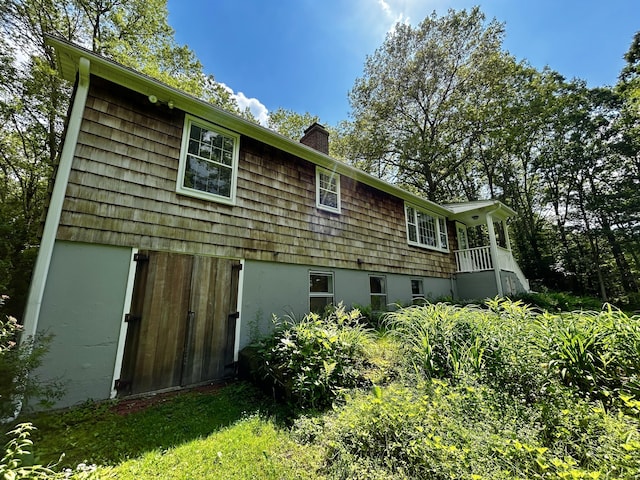 364 Locust Rd, Harwinton, CT 06791 - view of side of home featuring a chimney