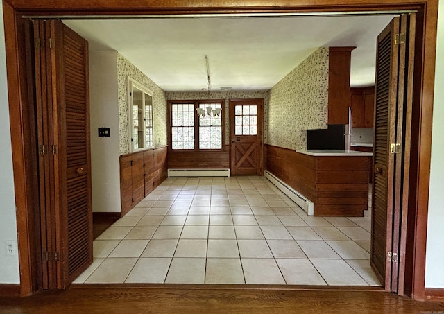 364 Locust Rd, Harwinton, CT 06791 - entryway featuring a baseboard radiator, baseboard heating, wallpapered walls, and light tile patterned flooring