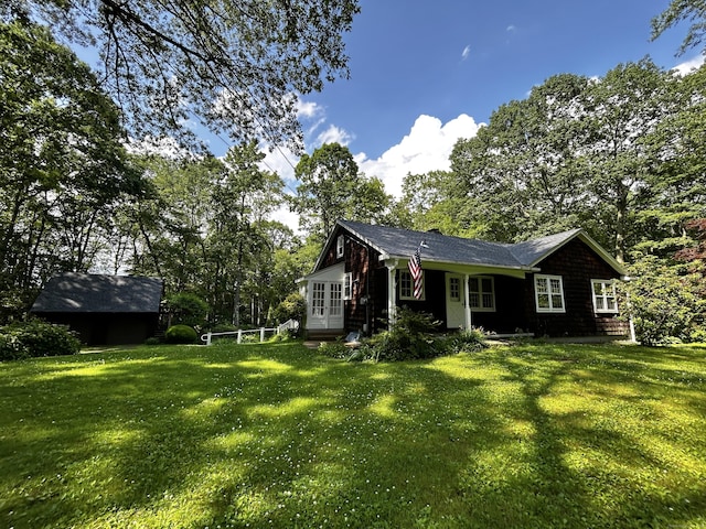 364 Locust Rd, Harwinton, CT 06791 - view of front of property with a front yard, french doors, and view of scattered trees