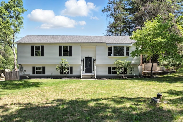 15 Beech St, North Branford, CT 06471 - raised ranch featuring a front yard