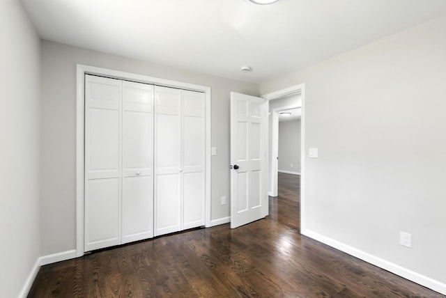 15 Beech St, North Branford, CT 06471 - unfurnished bedroom featuring dark wood-type flooring and a closet