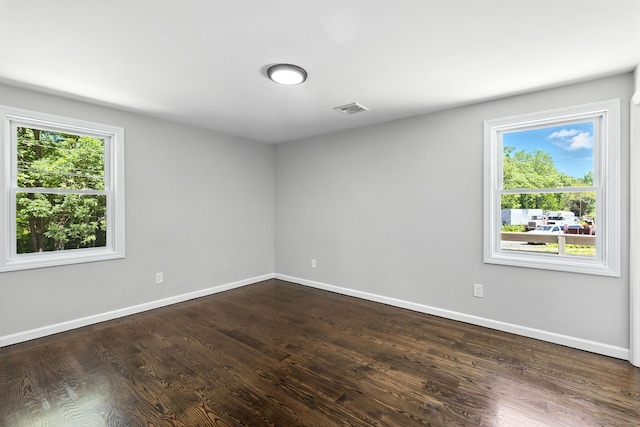 15 Beech St, North Branford, CT 06471 - unfurnished room with plenty of natural light and dark wood finished floors