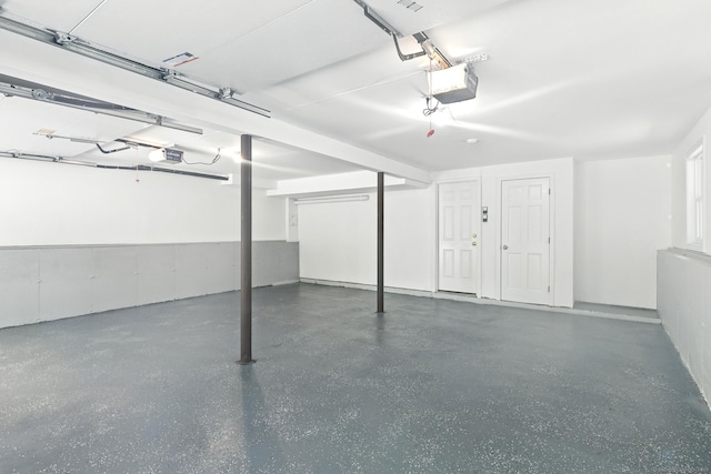 15 Beech St, North Branford, CT 06471 - garage featuring a garage door opener