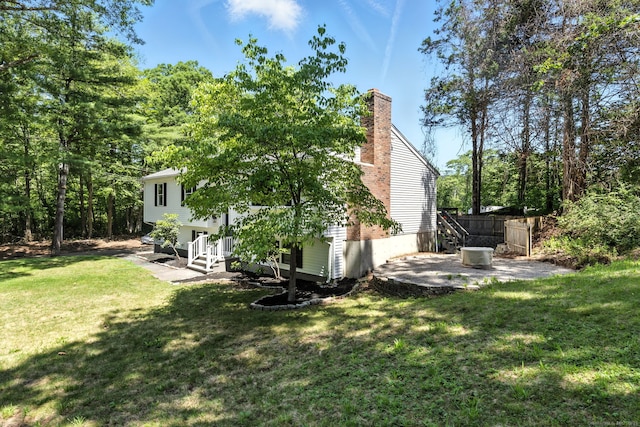 15 Beech St, North Branford, CT 06471 - view of green lawn featuring a patio