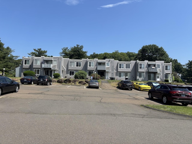 12 Cedar Ct Unit D, East Haven, CT 06513 - view of asphalt road featuring a residential view