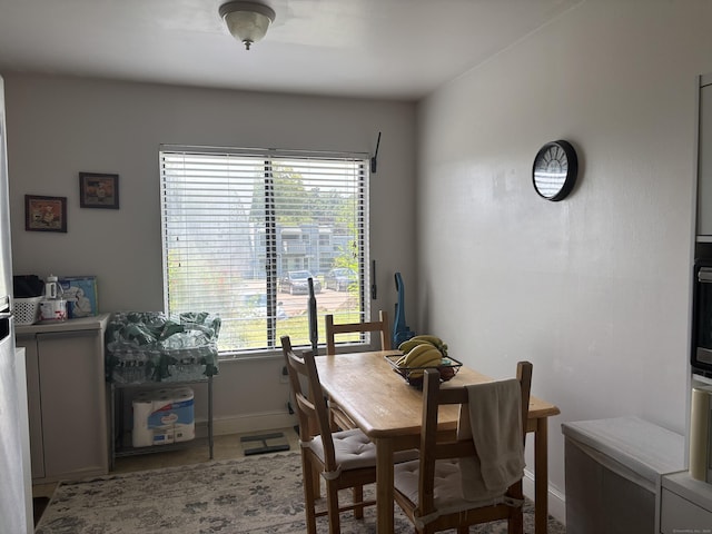 12 Cedar Ct Unit D, East Haven, CT 06513 - dining area featuring baseboards