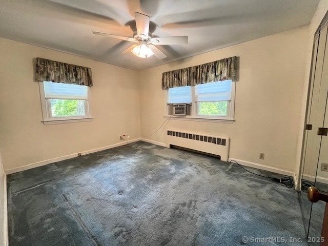 49 Geneva Ave, West Hartford, CT 06107 - unfurnished room with radiator, a ceiling fan, dark colored carpet, and cooling unit