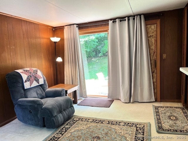 49 Geneva Ave, West Hartford, CT 06107 - sitting room with carpet floors and wooden walls