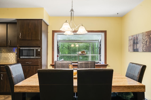 64 Melcon Dr, Southington, CT 06489 - dining area featuring a chandelier