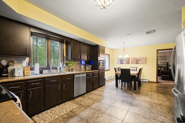 64 Melcon Dr, Southington, CT 06489 - kitchen featuring stainless steel appliances, backsplash, a chandelier, dark brown cabinetry, and a baseboard heating unit