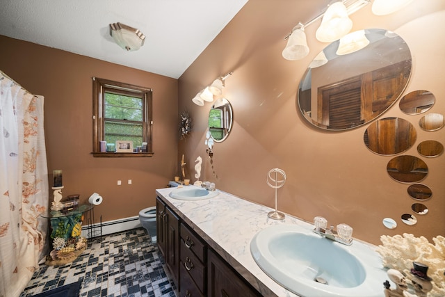 64 Melcon Dr, Southington, CT 06489 - full bath featuring a baseboard radiator and double vanity