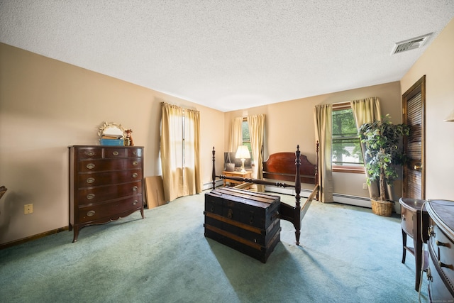64 Melcon Dr, Southington, CT 06489 - bedroom featuring carpet floors, a textured ceiling, and a baseboard radiator