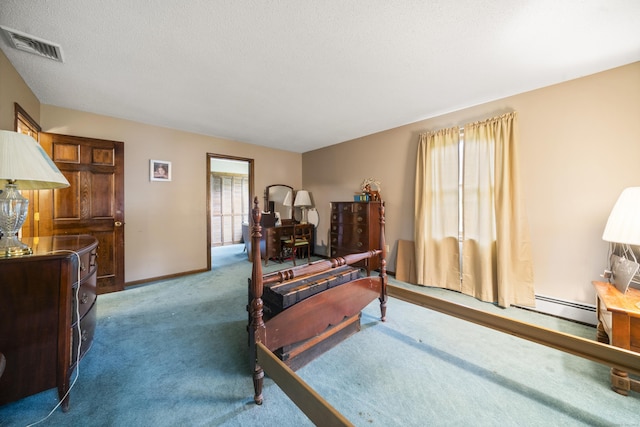 64 Melcon Dr, Southington, CT 06489 - carpeted bedroom featuring baseboard heating and a textured ceiling