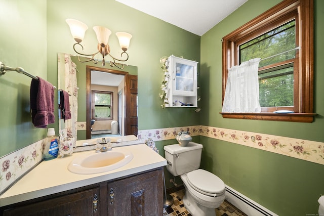 64 Melcon Dr, Southington, CT 06489 - bathroom featuring a baseboard heating unit, plenty of natural light, a chandelier, and vanity