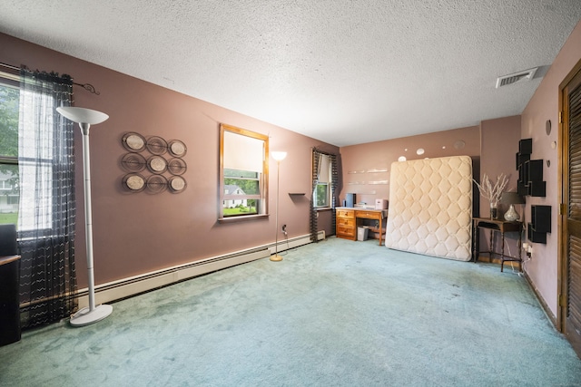 64 Melcon Dr, Southington, CT 06489 - unfurnished living room with carpet, a textured ceiling, and a baseboard radiator