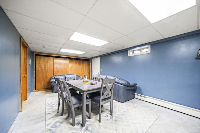 64 Melcon Dr, Southington, CT 06489 - dining room featuring a baseboard heating unit and a paneled ceiling