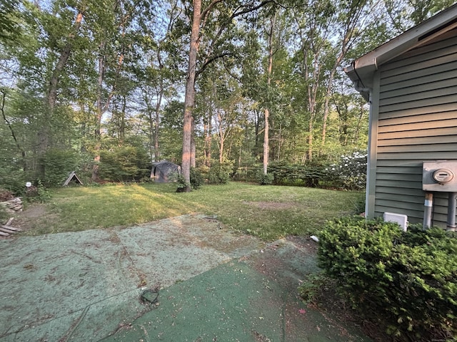 6 Orleans Ave, Killingly, CT 06239 - view of grassy yard featuring a patio