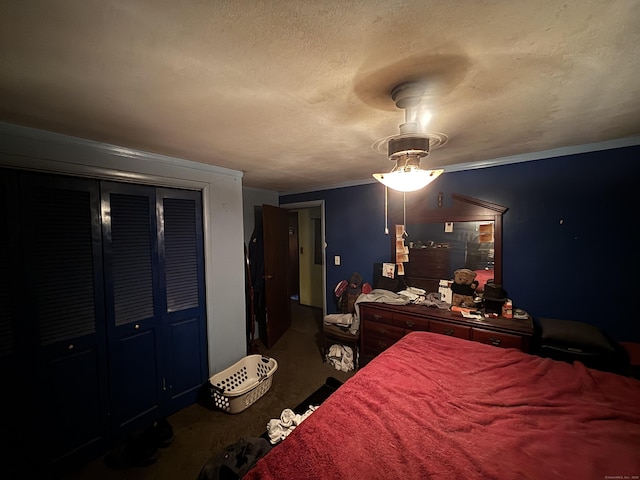 6 Orleans Ave, Killingly, CT 06239 - bedroom with carpet floors, crown molding, a closet, and a textured ceiling