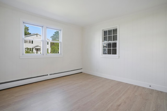 24 S Ave, Danbury, CT 06810 - spare room featuring wood finished floors, crown molding, and a baseboard radiator
