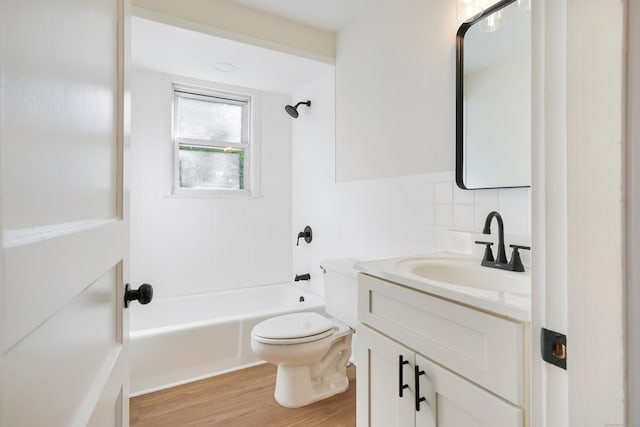 24 S Ave, Danbury, CT 06810 - bathroom with vanity, wood finished floors, shower / bath combination, and decorative backsplash